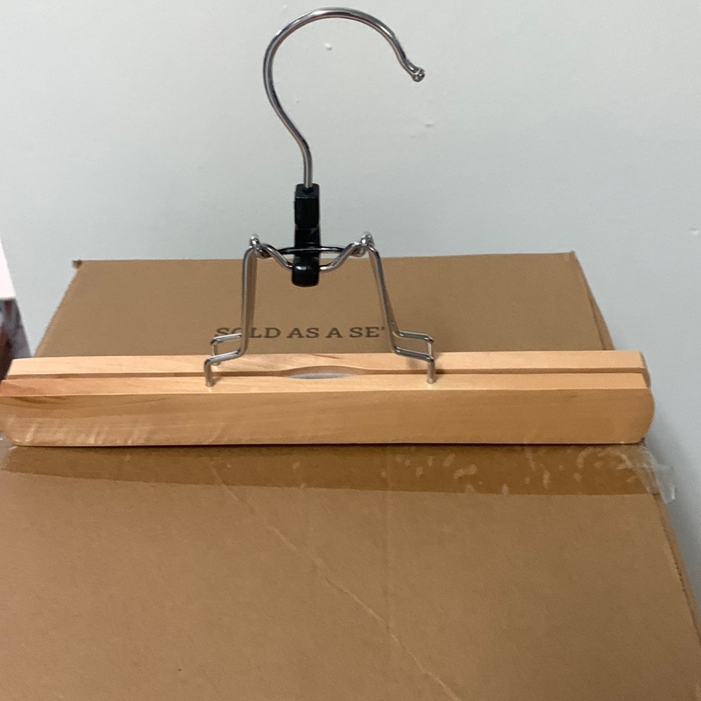 10 wooden skirt hangers sold as a set